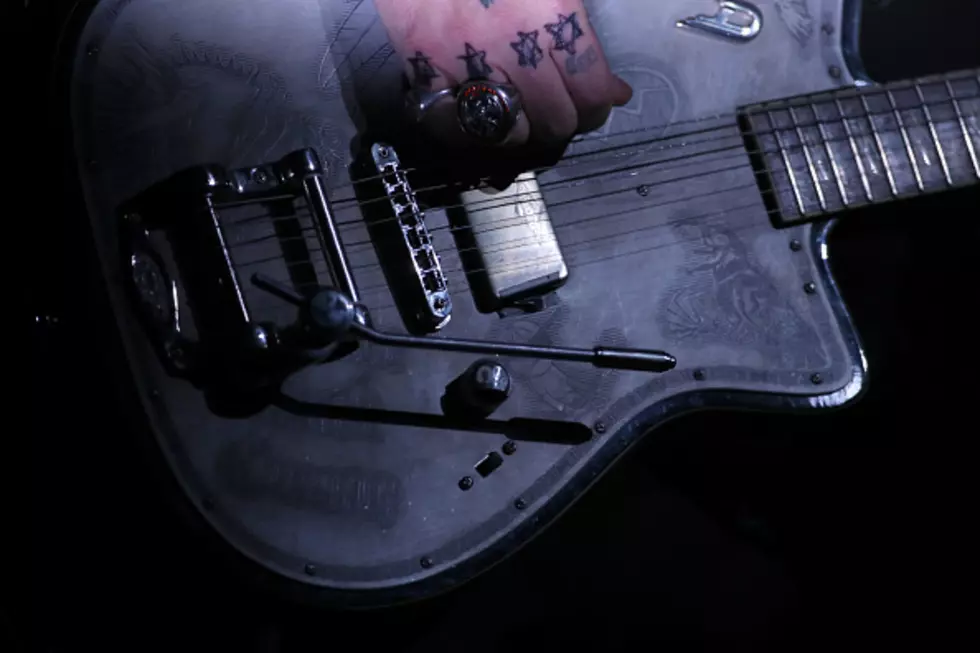Needle Guy With Guitar Vs. Doubtful Cop